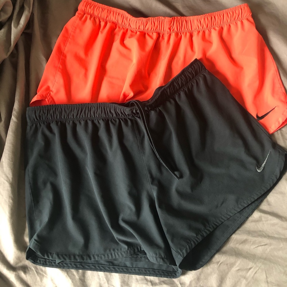 Orange and black Nike sport shorts